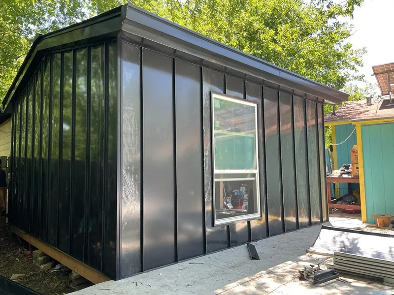 Black standing seam metal wall panels for Metal Roof Installation in Wynne